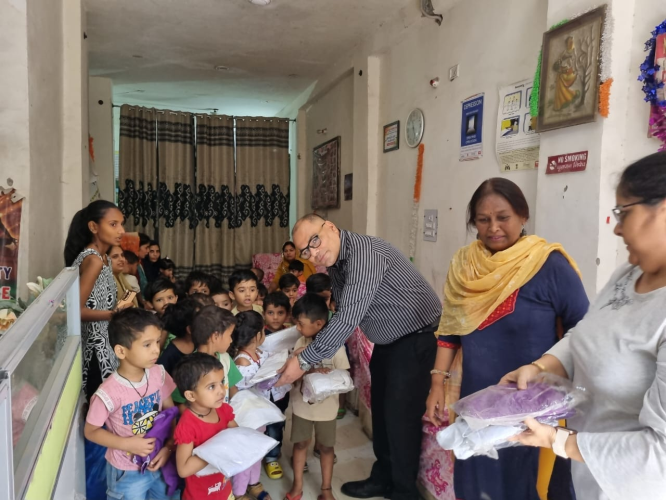 Cloths Distribution between the Children